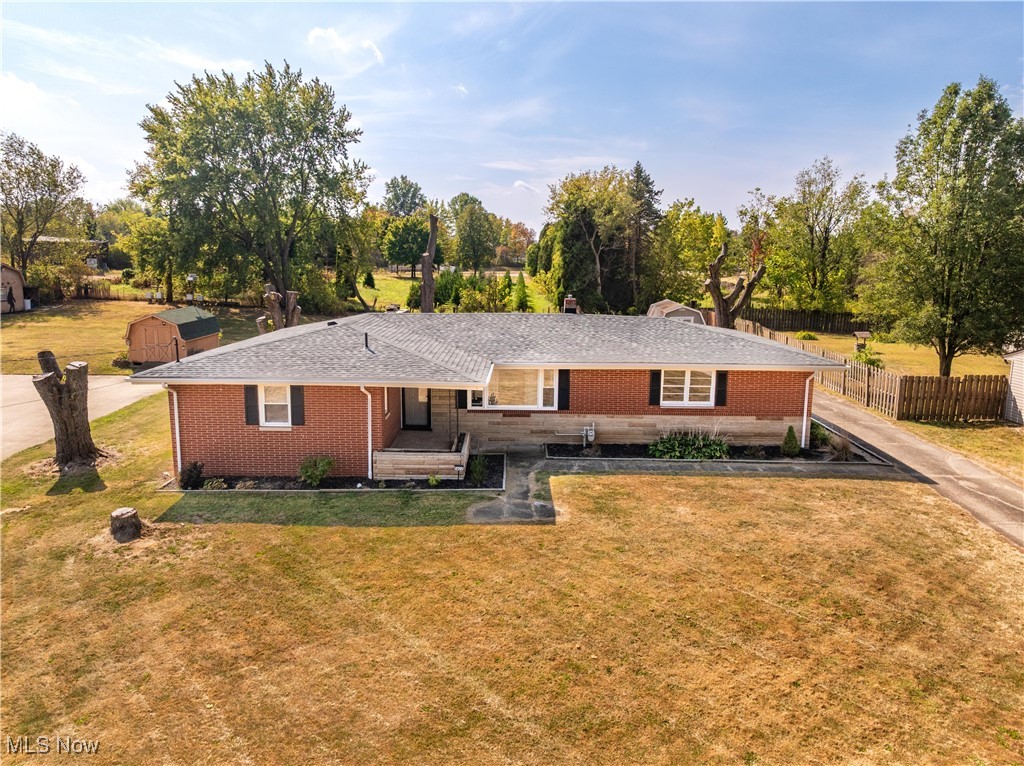 Welcome to this updated brick ranch home in Perry Local Schools. The layout features three bedrooms and two bathrooms, including a master with a half bath. When you walk through the front door, you are greeted by a living room that opens directly into the kitchen. The home has been fully renovated and is move-in ready. Updates include new carpet, new lighting, and all new appliances. A cozy wood-burning fireplace adds warmth to the main level, and for added convenience, a gas line has already been installed if the buyer wishes to convert from wood to gas. The basement is partially finished, waterproofed in 2023, and comes with a transferable warranty for the new owner. Additional improvements include new windows, a newer roof completed in 2023, and exterior updates such as new flashing, new downspouts, new gutters, and gutter guards installed in 2025. A reverse osmosis system for the refrigerator and upstairs sink was added in 2024. Outside you’ll also find a storage shed for extra space. This home is ready for its next owner to move in and enjoy with peace of mind knowing everything has been taken care of.