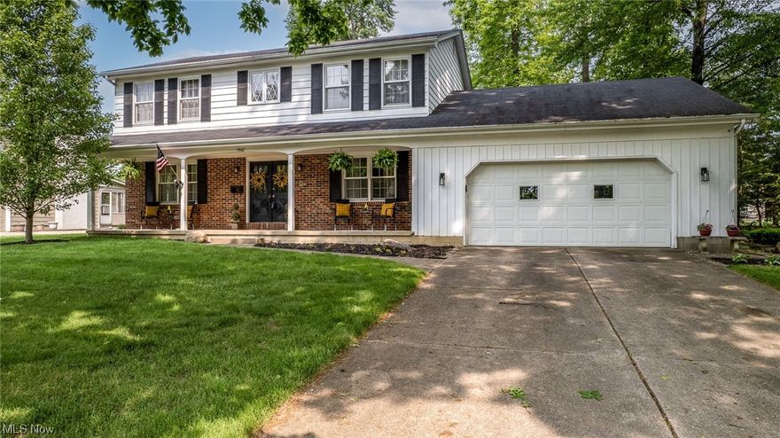 Welcome Home!  Fall in love with this quiet and mature Boardman neighborhood from the spacious front porch.  Sip morning coffee from the master bedroom balcony overlooking the large back yard.  Invite guests for dinner in the formal dining room or to socialize in the finished basement with wet bar included.
This 4 bedroom, 4 bath beauty with hard wood floors throughout is ready for it's next owner.
