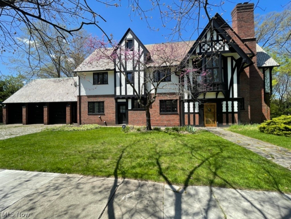 Welcome to this magnificent 7-bedroom, 7 fireplace modern Day Castle nestled in the heart of Cleveland Heights. This stately manor boasts an abundance of character and offers extra spacious rooms on every floor. Enjoy the rich charm of floor to ceiling French doors that bathe the family room with natural light, a formal dining room with a beautiful fireplace, and a meticulously crafted library with built in shelves perfect for quiet moments of relaxation or scholarly pursuits.
The stunning, updated kitchen features modern amenities and a layout designed for both culinary excellence and entertaining guests with ease. The kitchen offers great natural lighting, stainless steel appliances and a hand-crafted butler's pantry with custom shelving. A first- floor laundry room provides practicality and convenience with built in shelves, dedicated clothes hanging area, and plenty of room to maneuver comfortably.
With its elegant design and thoughtful updates throughout, this home offers a harmonious balance of historic charm and contemporary comfort, making it an ideal residency in Cleveland Heights. In addition, it is conveniently located minutes away from Cleveland's major hospitals, restaurants, museums and theater district.