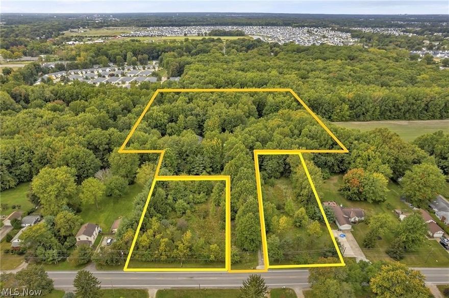 This is a rare investment opportunity with 10.45 beautifully wooded acres waiting to be enjoyed and/or developed. 2 acres zoned R2 Multiple Residence District and 8.45 acres zoned B2 Central Business District. See North Ridgeville zoning map attached. See all the many usage types as attachements.This valuable and versatile land abuts thriving commercial district on Center Ridge Road and backs up to newer subdivisions and is surrounded by single family homes. Someone can also reap the benefits of simply building 2 additional homes or multi-residential dwellings on the front 2 parcels and not disturb or distract from this private back property with already existing home. Perfect for developing or find complete seclusion, peace and nature. Property features 2 front lots and middle lot has existing 3,000+ sq ft. single family home that sits far off the road and has its own lake, barn, attached 3 car garage, and large fenced in back yard. Someone can work with this structure or start over. When you visit this property there are so many other amazing features I can share with you. Do not walk the property without setting an appointment. Cameras on property. Proof of funds or pre-approval necessary to view home and agent must be present. Buyer responsible for doing their own due diligence.