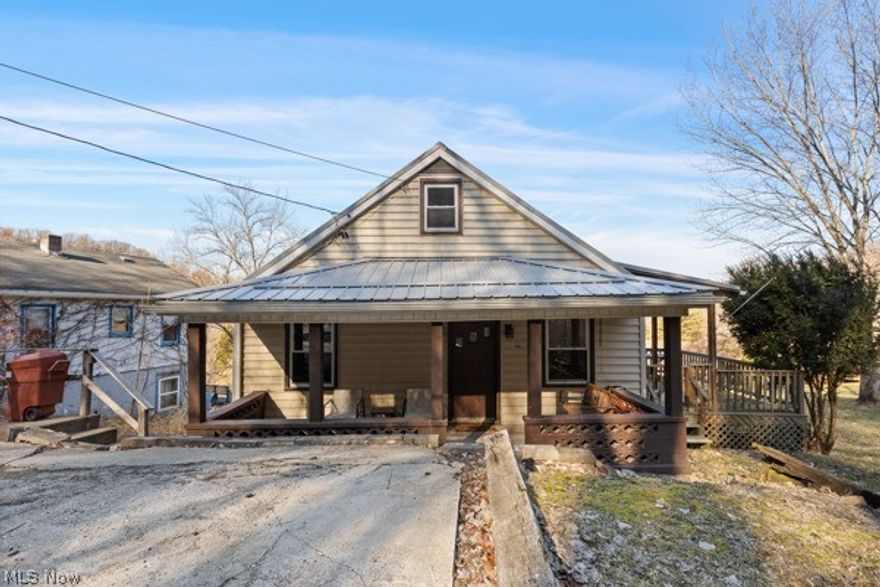 Charming and well-maintained, this 4-bedroom home sits on a spacious double lot totaling 0.25 acre — giving you plenty of outdoor space to enjoy — all while being just minutes from Route 22 for quick and convenient access. Priced at $94,900, this home features a welcoming living area and a functional, fully equipped kitchen designed for comfortable everyday living. Step outside to a large deck that overlooks the expansive yard, perfect for gatherings, relaxing evenings, or simply enjoying the extra elbow room. Added highlights include a durable metal roof and central air for year-round comfort and peace of mind. The fourth bedroom is currently set up as a dining room but can easily be converted back, or used as a home office, playroom, or flex space to fit your needs. Affordable, flexible, and conveniently located — don’t miss your chance to make it yours!