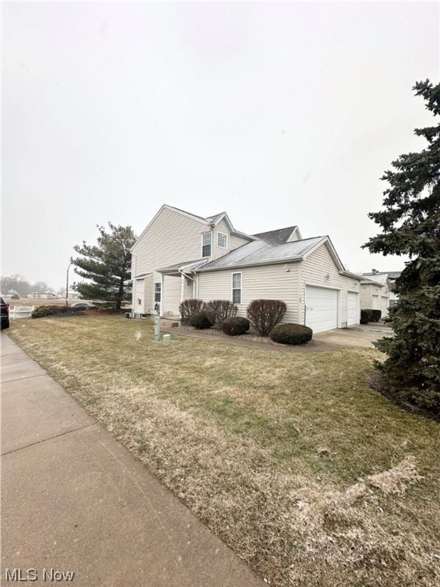 Great end unit completely move in ready! This open floor plan offers a large living room with fireplace, eat in kitchen with plenty of cabinet and counter space, 2 spacious bedrooms with lots of closets, one full bath and one 1/2 bath and a full basement that can be easily finished for additional living space. The home has been freshly painted and has newer carpeting throughout. Other updates include new LED lighting, Washing Machine 2023, Dryer 2023, Hot Water Tank 2023, Storm Door 2024, as well as newer Stainless Steel Kitchen Appliances. The desirable Hidden Park community also includes Landscaping and Snowplowing. There is a 2 car attached garage offering additional storage a patio perfect for enjoying the outdoors. Call today for a private showing.