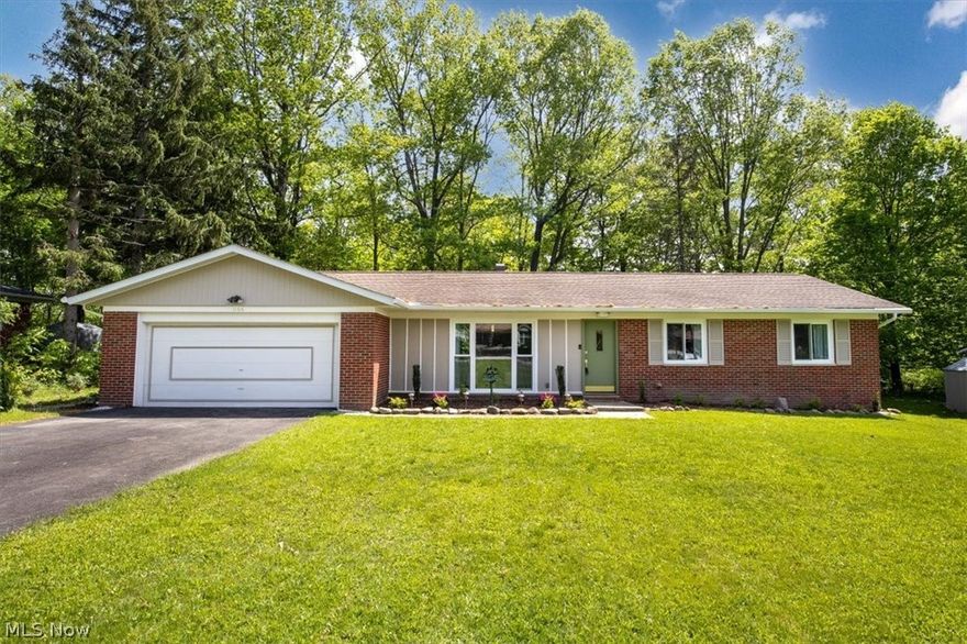 Absolutely beautiful 3 bedroom 2 full bath Ranch with 2 car attached heated garage.  Huge open kitchen with brand new white soft close shaker style cabinets*quartz countertops* ceramic backsplash* two sinks and all brand new stainless appliances. New LVT flooring and new carpeting in bedrooms. Both full baths were completely remodeled with new flooring, fixtures, and cabinets.  The living room features a trendy wood wall panel and a mounted electric fireplace. You will love the huge flex space/laundry area for a workspace/hobby room with plenty of storage and a butcher block counter.  Brand new washer and dryer.  As if that isn't enough, the furnace air conditioner, and every window in the house are all brand new.   Resurfaced driveway and new landscaping. This is a home you will not want to miss!!