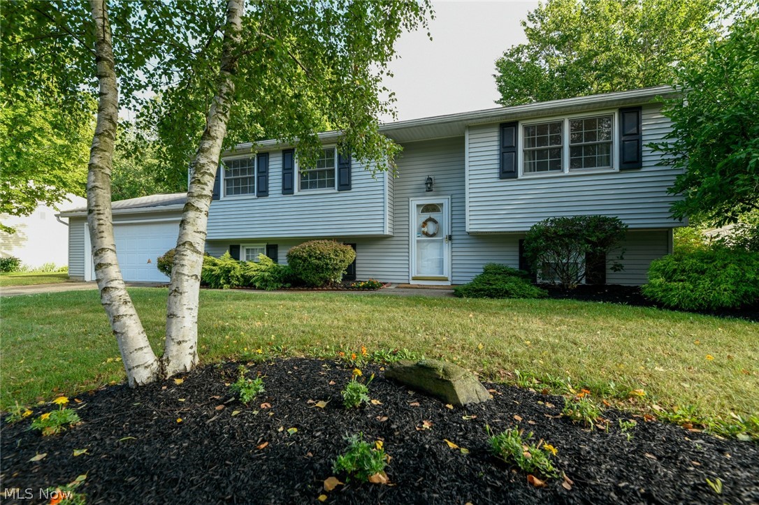This adorable, Stow home is the one you’ve been watching and waiting for!
Its bilevel floor plan features TWO large family rooms, 3 bedrooms, a dining room, and a kitchen boasting of stainless appliances and granite.
Entertain on your back deck while overlooking your nearly half acre yard! In addition to the 2 car garage, and in-home basement workshop, the backyard includes an oversized shed with a storage loft! This home can’t wait for you to call it yours.