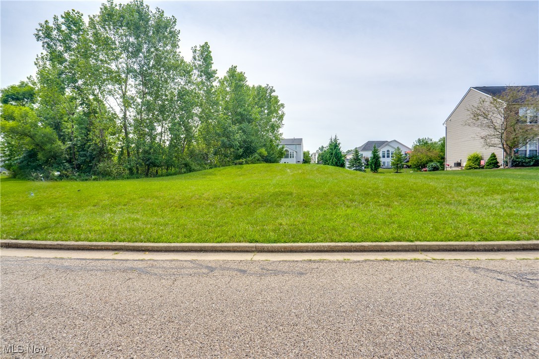 Located in the Montabella neighborhood within Plain Local Schools, this .31 acre buildable lot offers a rare opportunity to bring your dream home to life in one of the area’s most established and desirable communities. Montabella is known for its well-kept homes, wide streets, sidewalks, and a strong sense of community. Residents enjoy the convenience of being just minutes from Belden Village, The Strip, and major highways, making both daily errands and commuting easy.
The lot requires a minimum of 1,900 square feet for a two-story home. It’s currently owned by Schumacher Homes, who can build you one of their coveted models or customize a plan specifically for this site. The opportunity is also open to you to bring on your builder of choice. If you’ve been waiting for the right neighborhood to build in, this could be the perfect fit.
