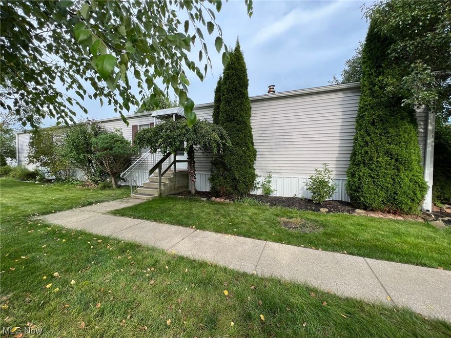 Spacious 3 Bedroom & 2 Full Bath Mobile Home in Chardon School District! 76x15 - 2007 Bayview Fairmount model includes large Living Room open to Eat-in Kitchen with plenty of cabinets & counter space, center island breakfast bar & all appliances are included. Master Bedroom includes walk-in closet, private full bath with garden tub & separate shower. Laundry Room is off the kitchen and washer & dryer stay with home. Nicely landscaped with mature plantings, small patio plus storage shed. Double wide concrete drive/parking. Positioned on one of the larger lots in Jacques Community!