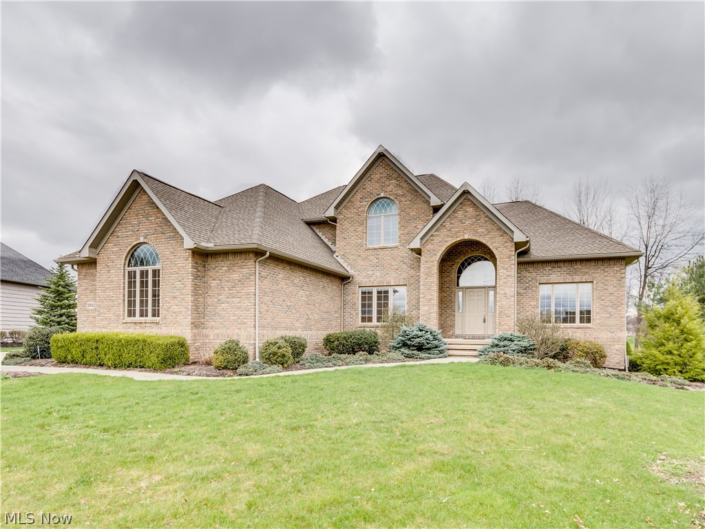 Phenomenal all brick 1.5 story contemporary on .49 acre cul de sac lot in Chenoweth Estates, a golf course community* Quality built 2005 by Somers & Swartzentruber w/4 BR (1st flr master), 2 full/2 half BA, approx. 3171SF plus 1400SF in the beautifully finished walkout lower level* 2 story foyer w/custom curved staircase, oak flr & palladium window* Great rm w/window wall & den w/wall of built ins & crown molding--both w/11' ceilings* 9' ceilings thru out rest of 1st floor* Kitchen w/granite, stainless appliances, breakfast bar, walkin pantry, roll out shelves & tile flr.* Bayed dining area w/ tile flr &Atrium door to 2 tier composite deck* 1st flr mstr & mstr bath w/garden tub, oversized marble spa/shower, private commode & stained glass window* Spacious 1st flr laundry/craft rm w/closet, cupboards, sink & laundry chute fed from 2nd flr.*1/2 Bath w/wood flr & mud rm off of garage complete the 1st flr* 2nd flr w/3 spacious bedrooms, bath & walk in hall closet* 13 course walkout lower l