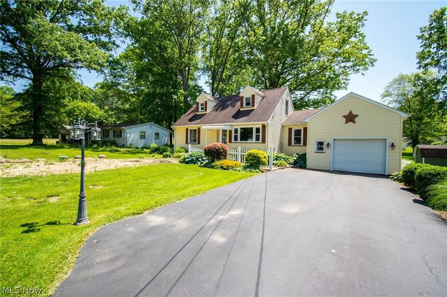 Fall in love with this charming, 3-bedroom, 3 FULL bath Cape Cod on a wonderful, quiet Austintown Street! This particular home radiates charm upon entering the front door.  Previous owner renovated this home to make it HANDICAPPED ACCESSABLE for his spouse and it was well done!  A previous main floor bedroom was turned into a handicapped full bath as well as the addition of a MAIN FLOOR LAUNDRY making it super easy to get around. Spacious rooms and ample storage throughout. Large kitchen with two pantry cupboards. Master bedroom on main floor w/ensuite and nice size closet. Second level consists of two lovely bedrooms and a full bath with shower. The newest segment of the home offers the addition of a huge rec room on the main level off the back of the house. Then, step out into a nicely finished enclosed three-season porch!  Enjoy those summer cookouts on your wonderful 3-tier deck off the porch that includes a natural gas grill, looking out over a beautifully fenced-in back yard!  Nice, over-size 1-car garage as well as a shed, to store all your lawn/garden care equipment. This home is certainly a "gem in the rough" and impeccably cared for since day one. She won't last long. Sellers offering a home warranty for worry-free living for your first year! 
New septic system installed November 2023.  (Septic company is scheduled to return to regrade the front yard.)