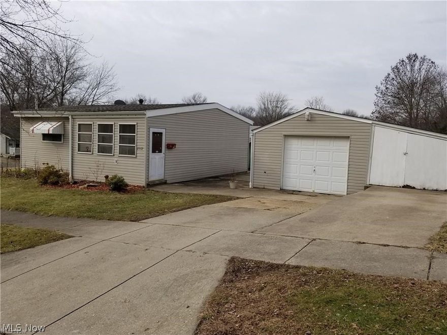 Sweetheart of a house -- great starter home or downsizer. Nothing to do but move in -- freshly painted and clean throughout. Walk into the enclosed front porch area and enter the open living room which leads to the kitchen and eating area. Two nice sized bedrooms with newer carpet and plenty of closet space. A finished basement has 2 rooms for gaming, relaxation, guest rooms or office. A half bath completes the basement. Concrete patio right outside the door to enjoy summer evenings. Shopping and restaurants just a short drive away. Plus convenient to the highway. Roof installed 2024/ Central Air 2024/ Furnace 2017. Call you favorite realtor today for a personal showing.