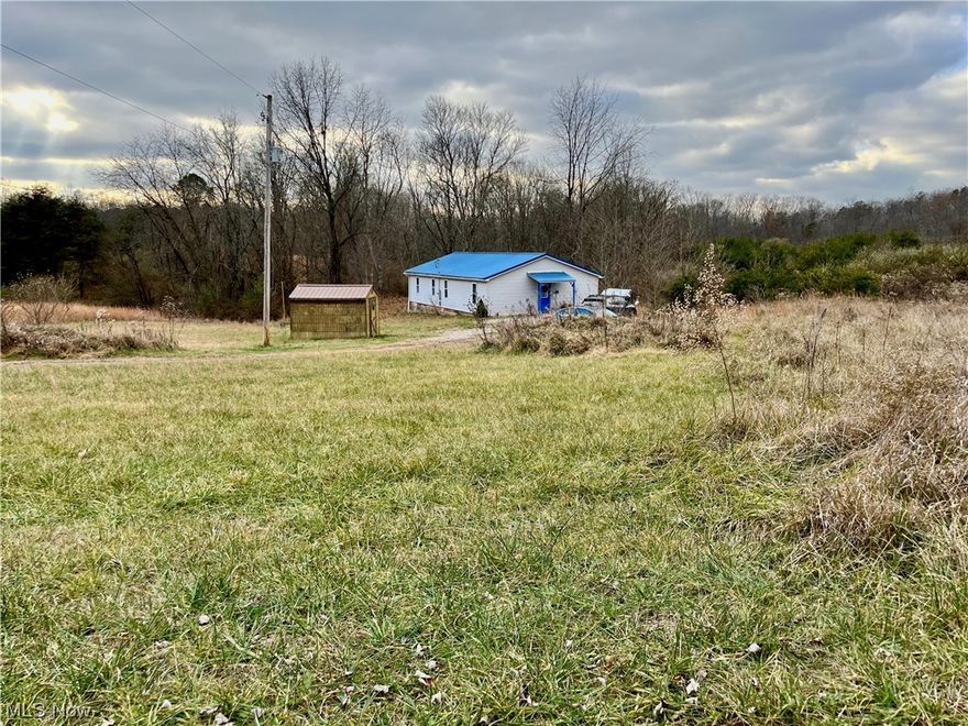 Check out these 10 acres of possibilities along with a cozy 9 year old slab home.  Just 2 miles from Ohio Route 7 and the Tuppers Plains conveniences and under 30 Minutes drive to Parkersburg, Athens, Pomeroy, this house offers fits-just-right, efficient living on one floor.  Flexible rooms to use as your needs dictate include an open living area, convenient laundry, an en-suite bedroom, and another huge bedroom designed to be split for a 4th as needed.