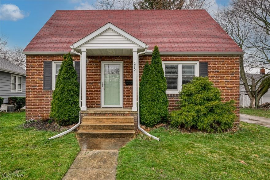 Welcome to this charming brick Bungalow with convenient highway access! This move-in-ready home features beautiful hardwood floors throughout the first floor, complemented by abundant natural light. Charming arched doorways in the living and dining rooms add timeless character to the home. The updated kitchen shines with stainless steel appliances (included) and fresh flooring installed in 2024. Down the hall, you'll find a stylishly updated bathroom with ceramic tile and a cozy first-floor bedroom. Upstairs, two generously sized bedrooms offer spacious closets and newly installed ceiling fans for comfort. The basement includes durable glass block windows, ensuring a bright and secure space. Outside, the covered carport doubles as a charming outdoor dining area, making it an ideal spot to enjoy the warmer months. The home also features newer interior doors, energy-efficient vinyl windows, and elegant faux wood blinds for added style and functionality. This home truly blends classic charm with modern updates. Schedule your private showing today!