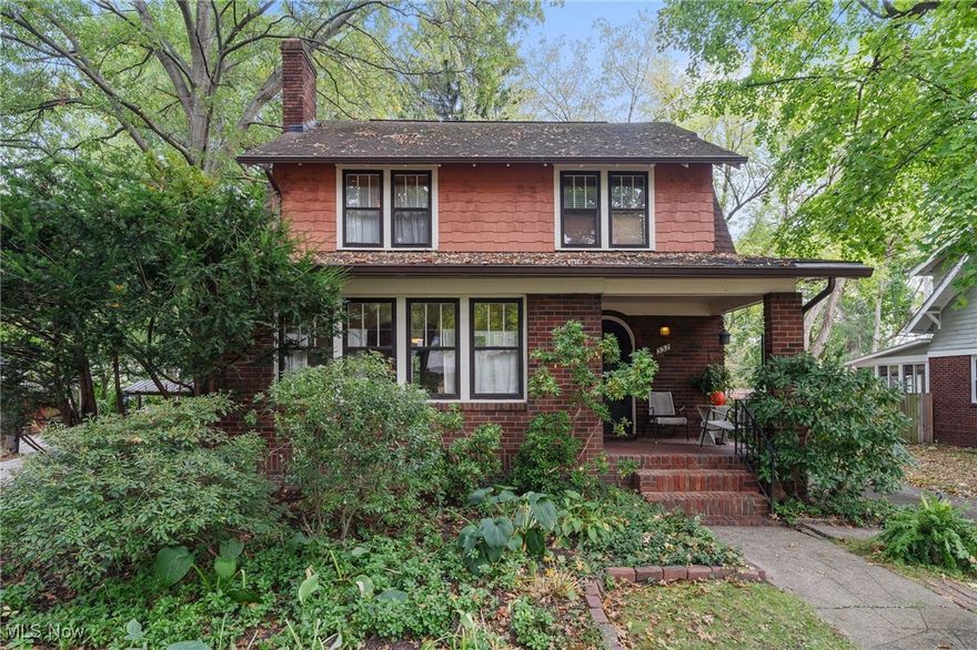 Welcome to 557 Letchworth Dr, Akron – A Classic Colonial in the Heart of Merriman Hills! This timeless 3-bedroom, 2.5-bath home blends warmth, charm, and modern comfort in one of Akron’s most desirable neighborhoods. Step onto the welcoming front porch—perfect for morning coffee or relaxing in the evening—and through the beautiful arched wood door into a spacious living room filled with character. You’ll love the brick fireplace, original wood-trimmed windows, and charming sunroom, ideal for quiet reading or conversation. The open layout flows seamlessly into the formal dining room, highlighted by a built-in wood cabinet with glass doors that adds both style and storage. A comfortable area toward the back could serve perfectly as an office, while the inviting eat-in kitchen offers plenty of natural light and direct access to the backyard. Upstairs, you’ll find three generous bedrooms and a full bath—each filled with charm and comfortable space for the whole family. The attic provides additional storage options. The partially finished basement expands your living space with a recreation area, laundry space, another full bath, and a bonus room—perfect for guests, hobbies, or a home gym. Outside, enjoy a peaceful yard with a deck for gatherings, a handy storage shed, and a detached 2-car garage. This beautiful Colonial offers the perfect balance of character and functionality—don’t miss your chance to make it home!