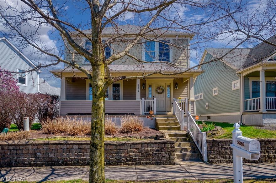 Tucked within the desirable New Haven community in Barberton this Colonial home offers the kind of everyday ease that just feels right. From the moment you arrive, there’s a sense of care in every detail. A landscaped setting, ready to bloom with spring color, welcomes you in and inside, natural light fills each space in the most beautiful way. The living room is both refined and comfortable, with custom built-ins framing a lovely fireplace, an inviting place to gather or unwind at the end of the day. Just beyond, a dining room lined with windows sets the stage for everything from quiet dinners to holiday celebrations. The kitchen is designed for real life: granite countertops, stainless steel appliances, and a walk-in pantry with thoughtful built-ins, opening to a sunny dining area and covered porch, where mornings begin slowly and evenings linger a little longer. You'll find a half bath and laundry room complete the main level. Upstairs, the primary suite feels like a retreat of its own, with a coffered ceiling, soft natural light, and a walk-in closet. The bath is beautifully appointed with marble finishes, an oversized soaking tub, and shower, your own quiet place to reset. Two additional bedrooms and a full bath offer comfort and flexibility for family or guests. An unfinished lower level provides endless potential: whether you envision a home gym, media room, or simply extra space to grow into. A breezeway connects seamlessly to the garage, adding both charm and function. Beyond the home, the neighborhood invites connection, with a nearby park, picnic pavilion, and open green space for play and everyday moments outside. Thoughtfully designed, beautifully maintained, and ready to be lived in; this is a home that simply feels good the moment you walk in.