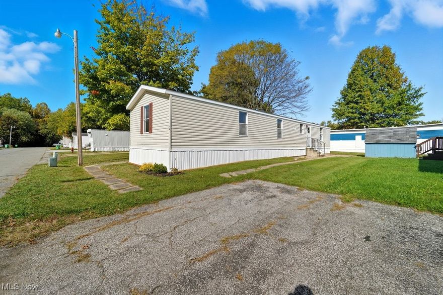 Discover affordable living with style in this fully remodeled 3-bedroom, 2-bath mobile home located in the revitalized Austin Woods community in Geneva. This move-in-ready home shines with fresh updates throughout, including an all-new roof, modern finishes, and a spacious, open layout perfect for comfortable everyday living. Step inside to find a bright and inviting living area, a refreshed kitchen with ample cabinet space, and updated bathrooms that feel clean and contemporary. The private primary suite offers great separation from the additional bedroom. Outside, enjoy a low-maintenance yard and all the benefits of living in a thriving, newly renewed neighborhood close to local conveniences.