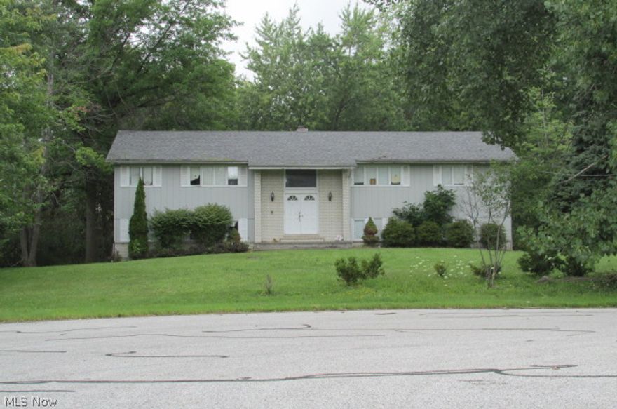 This is a bi-level style home at the end of a cul-de-sac.  There are three bedrooms on the main floor and one on the lower level.  Very large lot, over an acre and a half!  Very highly rated school system.  House is in need of work but an excellent opportunity for the right buyer.  Being sold "as is".  This property is now under auction terms.    See broker remarks.