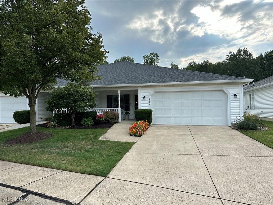 Welcome home to this single floor 2 bedroom, 1.5 bath home in North Ridgeville with maintenance-free living. This home has a 2 car garage for ample space to park. This 55+ community on approximately 17 acres has been well kept. This open floor plan with crown molding in the living area and white cabinets in the kitchen. This well kept home with neutral color palette, has a quaint front porch. Enjoy the fantastic flow of the home, abundant storage including space above the garage, and a natural light throughout. All appliances, including the washer and dryer, are included, conveniently located in the adjacent laundry room. Refrigerator is 7 moths old and hot water tank is 1.5 years old. Accessible oversized hallways and bathroom add to the home's appeal. Enjoy the outdoors without the upkeep.