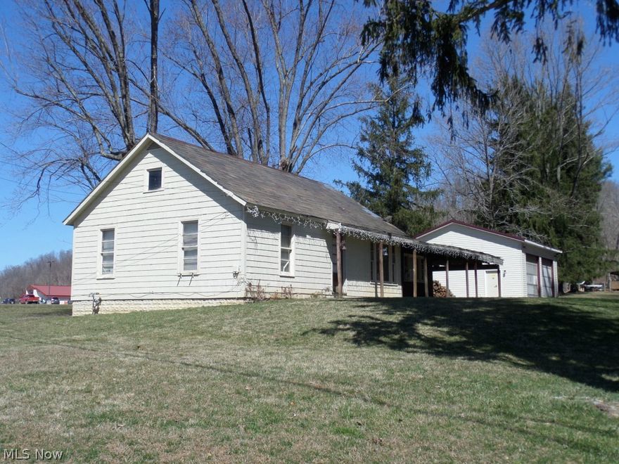 1.78+- Acres of Commercial or Residential Located near hardware, factories and many other businesses. Just one mile north of Mcconnelsville. Newer septic system. Fenced for horses