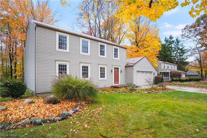 Beautiful Concord Twp Colonial with amazing yard backing up to a wooded area. This five Bedroom home offers so many updates and room throughout. New laminate flooring greets you upon entry and flows through the first floor Half Bathroom, large Living Room and formal Dining Room. Wood Burning Brick Fireplace accents the first floor family room with sliding doors that lead to the deck that overlooks the backyard. Eat In Kitchen is lined with hickory cabinets, generous counter space, SS appliances, double sink and pantry. Spacious Master Bedroom has double closets, an updated private master bathroom with tiled floor & walk in shower. New carpeting through all five bedrooms, the upstairs hallway and staircase. The second updated Full Bathroom has tiled floor, vanity and tub with sliding doors. Unfinished, full basement adds opportunity to expand, laundry area with washer and dryer, sink and sump pump with utilities located in a perfect place to be able to use the space wisely. The well cared for home has a Newer Metal Roof, vinyl siding, concrete driveway, windows, garage door and HVAC system. Attached 2 car garage with opener, attic storage with new retractable stairs and electric. Riverside school district and many amenities close by.
