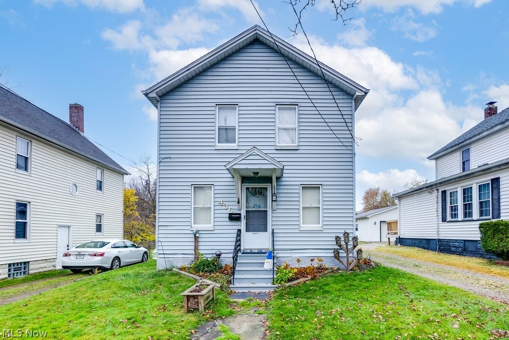Welcome to this well cared for Colonial in the heart of Ravenna. The spacious Kitchen has a such a large pantry you could easily make this a first floor laundry room. There is also a first floor bedroom that the sellers used as a laundry room. A closet could be added and you could turn this into a 4th bedroom. The 3 bedrooms on the second floor were freshly painted. The back sitting porch leads to a large fenced in backyard with an oversized 2+ garage. The long time owners have loved and cherished this home and would love to see you cherish it as well.