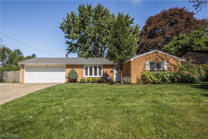 Look at this beautiful 3 bedroom brick ranch in the heart of North Canton! Offering one floor living with stunning hard wood floors and new paint throughout. As you walk through the front door, you enter into the main living area with a brick fireplace to cozy up to. To the right you will find the master bedroom. Then just down the hall are two more spacious bedrooms with nice size closets and one more full bathroom. The updated eat-in-kitchen (2017) with stainless steel appliances has access to newer patio (2018) through sliding glass doors out the back of the house for you to enjoy summer BBQ's in the quiet backyard. As you make your way to the partially finished basement, you'll notice an area that could be used for a man's cave or kids play area. You will also find a laundry room and work area with lots of storage. Additional updates to this home include: 2018 new sidewalk at front of the house, hot water tank, new furnace and central air. Sellers are including a Home Warranty for