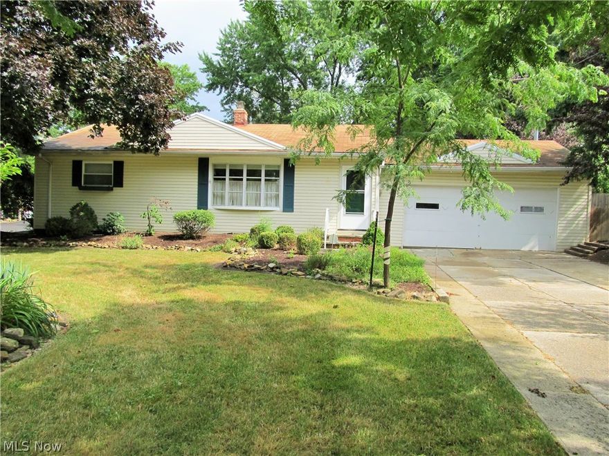 Welcome home.  Beautiful, well maintained ranch with many updates is move in ready!  Great curb appeal.  Once you enter the house you will notice the spectacular refinished hardwood floors.  This cute, super clean ranch offers large living areas with 3 bedrooms and 2 baths.  The updated eat-in kitchen has plenty of cabinets and counter space.  The sliding door off the kitchen offers rear access to the spacious nicely landscaped fenced in backyard.  The deck provides built-in seating and hot tub. Enjoy the warmer months on the wonderfully maintained covered patio area.  The basement provides a rec room with pool table and full bath; great for entertaining.  There is an additional room in the lower level that can be used for an extra bedroom or office.  The waterproofed basement also includes a laundry area with washer and dryer along with built-in shelving for your storage needs.  The attached two car garage is heated with washer/dryer hookup.  Additional improvements include newer AC u