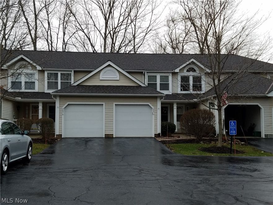 Tasteful & move-in ready condo backing up to the woods! Completely remodeled kitchen includes granite counter tops, designer white cabinetry with panel doors & accent of glass doors. The kitchen also features a desirable breakfast bar long enough for four cabinet height bar stools, stainless steel sink, faucet, soap dispenser & built in microwave oven with lights. All appliances are included including built-in dishwasher & microwave, stove & refrigerator. The half bath is also completely remodeled with a new designer vanity, sink, faucet, mirror, light fixtures & ceramic tile floor. For additional aesthetics and warmth, the living room has a gorgeous wood burning fireplace, stone surround floor to ceiling & hearth stones for a beautiful look & warmth. The second floor full bath is also remodeled featuring ceramic tile laid on the bias with same new features as main floor bath. The curved shower rod gives the updated bathroom a spa-like feel. All carpet was removed from the bedrooms & l