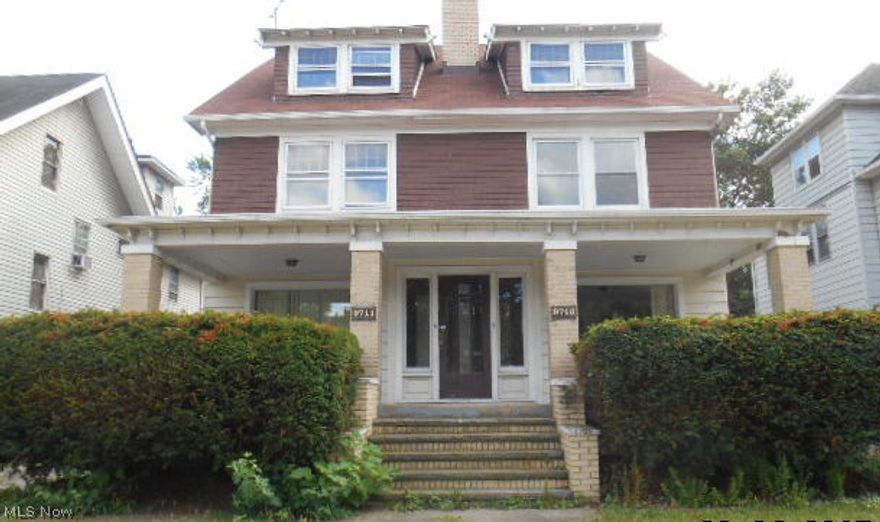 MUST SEE!! Spacious Colonial featuring over 3300 square feet. Each unit consists of: Large kitchens with ample cabinetry; counter space plus an Eat-in-area. Formal dining rooms with china cabinets and window seat.  Living rooms have an abundance of windows to allow the natural light through.  Nice sized bedrooms!! 3 Car Garage.  Full basement with plenty of built in cabinets for extra storage.  Close to Downtown Cleveland; Edgewater Park; Restaurants and much more.  This will not last long, Schedule Your Showing Today!!