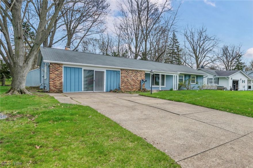 Rare opportunity to live on a quiet, country-style, low-traffic street with serene wooded views from your peaceful backyard covered patio. Solid, spacious 3-bedroom, 2-full-bath ranch offers desirable one-floor living at its best w/open, airy floor plan & vaulted ceilings that enhance the sense of space & light. Home is filled with natural light from numerous windows, including a large front window added in 2017. Though the interior is ready for your personal cosmetic updates, the home has been well cared for mechanically over the years. Recent improvements include vinyl siding with brick accents (2019), vinyl windows (2013), updated entry doors (2019), a PVC sewer line to the street with cleanout, updated plumbing (2018), and a 30-year shingle roof installed in 2005. Vaulted living and kitchen areas feature exposed beams for added character, while the large dining space opens seamlessly to the family room—perfect for entertaining. Home also includes two cozy woodburning stoves, a fantastic first-floor laundry room w/washer & dryer included, an owner's suite w/direct bath access & generous closet space. The attached garage has been converted into additional living space/rec space but could easily be returned to garage use. Private backyard, storage shed, and wooded views complete this peaceful retreat. With its flexible layout, strong bones, and tranquil location, this home is a perfect opportunity for buyers looking to add value and enjoy country-style living close to modern conveniences/highways.