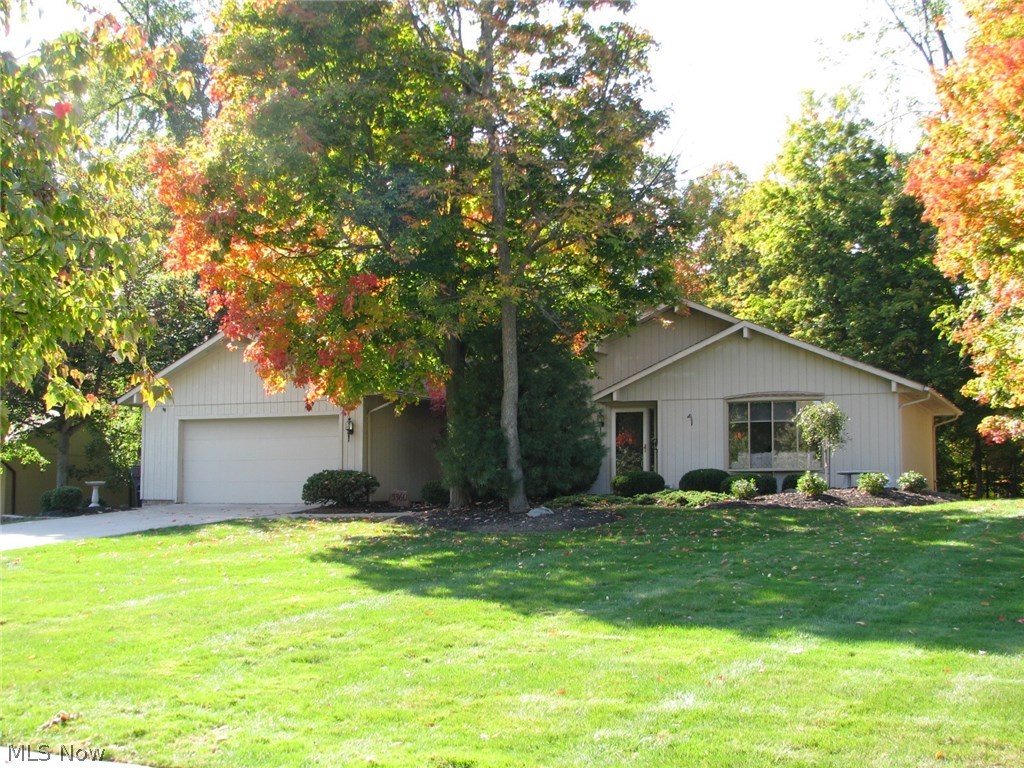 Breathtaking ranch with incredible park like yard!! Master suite is a private oasis that features a remodeled bath, walk in closet, vanity area, and tranquil views!! Relax in the oversized family room that features skylight, full wall fireplace and walkout to the sunroom!! Huge deck with built-in firepit!! All the big-ticket items have been replaced. Newer roof, furnace,driveway, the list goes on and on! Enormous extra deep finished basemnent with half bath!! Heated garage!! Impressively decorated and meticulously maintained!! An incredible offering!! Neutral colors and incredibly clean from top to bottom!!