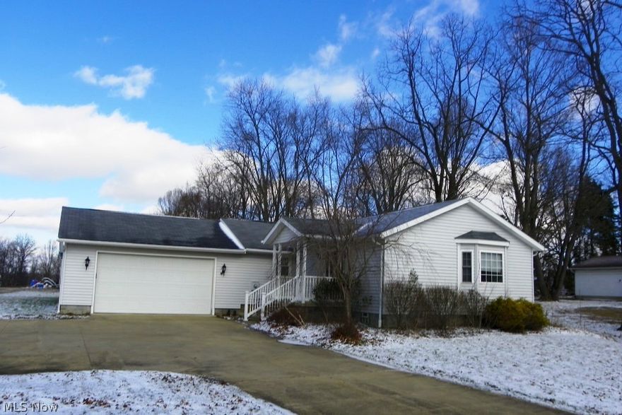 Must see to appreciate this spacious 2 bedroom, 2 bath ranch with 1728SF (main level), full basement & 2 car attached garage* Open floor plan & neutral décor* Entry with beveled glass door & side lights, guest closet & walk in closet* Wood floors in Great room & formal dining* Eat in kitchen with oak cabinets, crown molding, walk in pantry & fully applianced (refrig, range, microwave & dishwasher)* Master bedroom with slider to patio & small fenced in area for your pet, bath & fan* 1st floor laundry* 18x10 guest bedroom* Updated guest bath* 6 panel oak doors* Full basement with glass block windows* Generous attached 2 car garage* Easy access to floored attic* Central hook up for cable & computer (outlets in most rooms)* Level .56 acre * Covered porch* Immediate possession* Home Warranty provided*