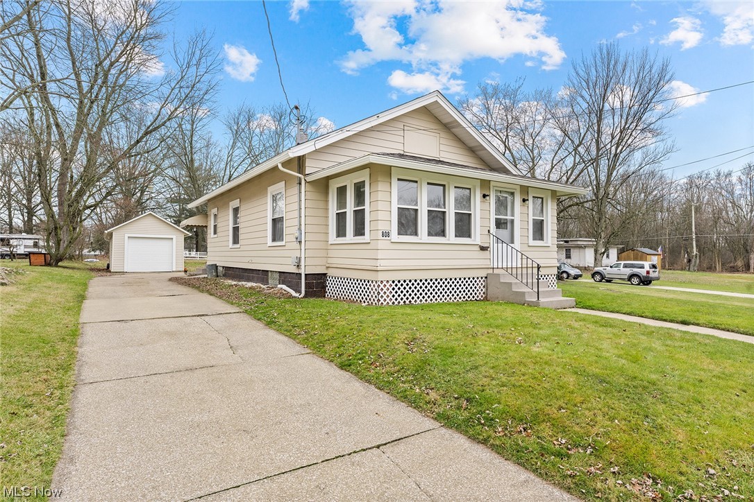 One floor living at its best with this charming ranch home in Orville! First floor laundry and mud room, updated kitchen, formal dining room and nicely sized living room. Vintage clawfoot tub in the bathroom. Newer roof and replacement windows throughout! Deep lot and one car detached garage. Dont miss it!