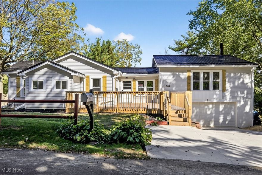 Welcome to this beautifully renovated home in the heart of Coventry Township and Springfield LSD! Featuring 3 spacious bedrooms and 1 full bathroom, this property has been completely updated from top to bottom, offering the perfect blend of modern comfort and classic charm. As you arrive, you’ll notice the brand-new exterior finishes, fresh landscaping, and an inviting front deck that sets the tone for what’s inside. Step through the door into a bright, open floor plan highlighted by new flooring, fresh paint, and abundant natural light. The kitchen is a showstopper, with brand-new white shaker cabinets, sleek countertops, stainless steel appliances, and a stylish black faucet. The adjoining dining and living spaces flow seamlessly, making it ideal for entertaining or relaxing with family.
The bathroom has been fully remodeled with modern fixtures and finishes. The bedrooms are generously sized with plenty of closet space, perfect for comfortable everyday living. Schedule your private showing today. Updates include roof, siding, deck, windows, paint, flooring, kitchen, bathroom, plumbing & electrical.