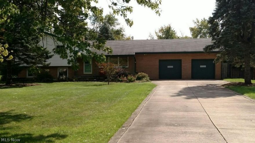 4 bedroom, 2 bath on large lot. Rear yard with privacy fence and two storage sheds (one with electric). Koi pond with fountain. Rear patio includes hot tub. Family room with wood burning fireplace. Vaulted living room. Spacious 2.5 car garage. Lifetime warranty Stanek replacement windows.