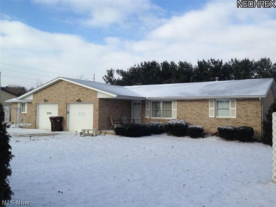 Great opportunity. Quality Income Property. 1309-1311 also available next door. All brick side by side duplex built in 1990, shingle roof, concrete drive plus off street parking. 2044 total sq. ft., gas heat, central air, city water and sewer, 110'x150' lot. Each unit has attached and finished 1 car garage, front living room, appliance kitchen, dining room with access to rear deck, 2 bedrooms, full bath on main level, guest and linen closets, full basement, block foundation, 100 amp electric, half bath and laundry hookup. 1215 has 13'x13' nicely finished family room and 13'x13' den/office in basement. Good rental history, long term tenants. Rents $650 each side. Tenants pay all utilities except sewer.