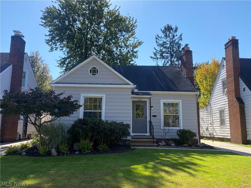 Move right into this meticulously maintained 2 bed, 1 bath home with fabulous curb appeal in a quiet neighborhood just minutes from the new Van Aken District. Talk about easy, 1-floor living! This home is a perfect investment property or alternative to condo living, keeping it simple without the high HOAs. Entire house has been freshly painted in a neutral color to allow for buyer to easily move in & add their own finishing touches. Living room has working WBFP, large window allowing for natural light to stream in, & beautiful original hardwood floors. Wood floors continue into the formal dining room, with 2 windows & a ceiling fan, again allowing for lots of natural light & a comfortable breeze. Through the dining room you'll enter the kitchen which comes equipped with refrigerator, gas stove, double stainless steel sink, & plenty of cabinetry. Finishing off the main living space are 2 nice sized, bright bedrooms, both with hardwood floors & ceiling fans. The full bath is recently upd