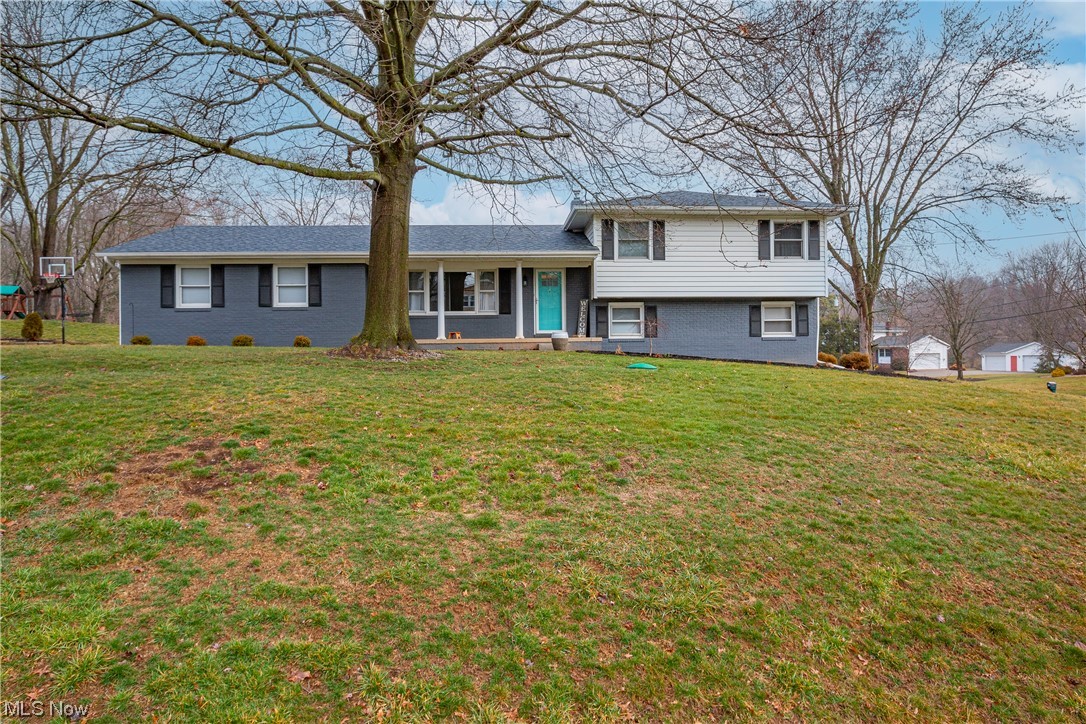 Americas Preferred Home Warranty Included! Beautiful modern split-level home with spacious yard and open floor plan in Jackson school district. The backyard is fenced in with Lite House installed above-ground pool only used in the 2022 season. Large side yard with shed for all your other outdoor play. The double driveway turns into a broad garage. Sit and sip your morning coffee on the ample front porch. Major landscaping updates done in 2020 by Naturescapes. New kitchen appliances (Frigidaire) in 2018. Brand new vinyl plank kitchen flooring 2023. Beautiful fireplace in the family room. Freshly painted! Spacious owner's suite, 3 additional bedrooms, 2 full bathrooms, and a bonus room that is currently a beautiful office space (remodel completed in 2020) with double doors to patio, fire pit, and pool. Centrally located to Green, Portage Lakes, Jackson Township, Canton, etc. This one is certain to go fast! Schedule ASAP!