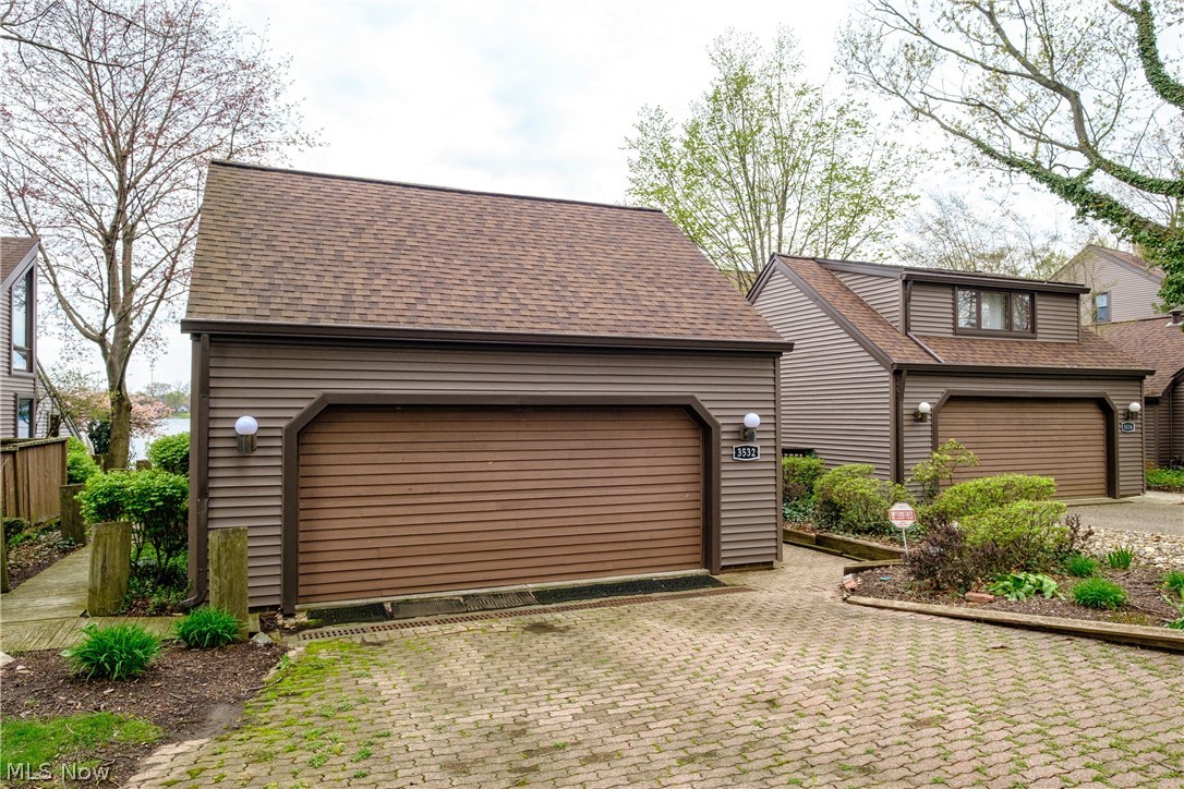 Vacation Year Round! This unique lake front home is one of a kind. Boasting over 2,600 Square Feet of open spaces and soaring ceilings this condo embraces the Lake at its finest. The main living area has views of the lake from every angle and was built with entertaining in mind. The two story Great Room opens out to an expansive tiered deck overlooking the Lake. Offering a first floor Bedroom and Bath along with a magnificent 2nd Floor Master with large walk in closet and His/Her Baths. Waking up will feel like paradise every day of the year. In addition there is a bonus area over the garage that functions as either a 3rd Bedroom/Family Room or Office. This home is amazing and waiting for your own personal touches.