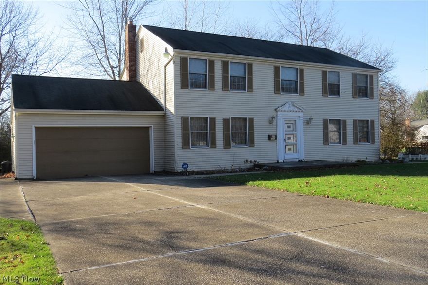 This two story is a rare jewel boasting five bedrooms, two and a half baths. Over 2300 sq feet serves up additional must haves such as an eat in kitchen adjacent to an ample sized family room, a formal dining room, living room, laundry room, and half bath all on the first floor. Master bedroom hosts a full bath. Remaining four bedrooms and additional full bath make up the remaining second floor. Plenty of closets too. The gleaming exposed hardwood floors are an eye catcher through- out. The expansive basement homes a one year old furnace as is the air conditioning unit, hot water tank mfg date is 2016, glass block windows, very new sump pump, and hook ups if you want to move the laundry. Electric box and main outside have been updated. Just pack your bags and park in the two car garage so this can be called your home. Call now for a showing before it is gone.