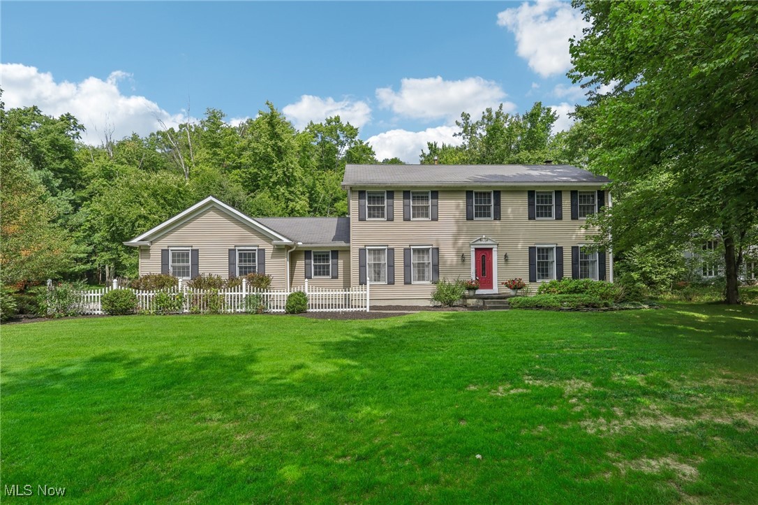 Welcome to this stunning Center Hall Colonial nestled in the highly sought-after Lake in the Woods subdivision in Bainbridge.