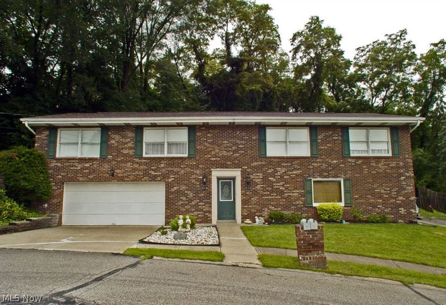 A must see! This beautifully remodeled duplex sits on 2 lots on a cul-de-sac. Imagine living in the larger 2BR,2BA side that boasts over 1500 sq. ft. while renting the smaller 2BR,1BA side for great income potential!