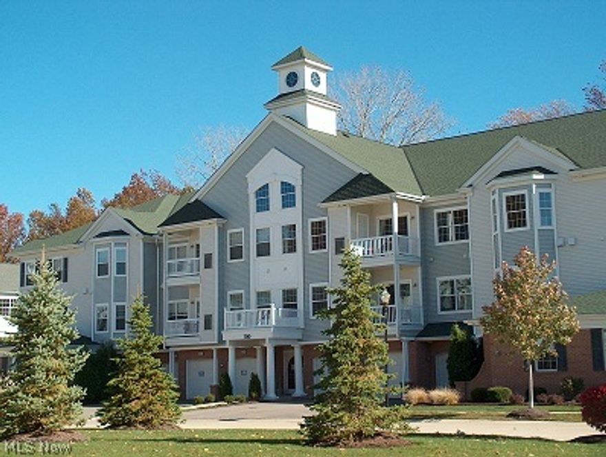 The Aqua Marine Country Club Living community.  Enjoy a relaxing recreation community lifestyle with the nicest clubhouse on the west side which features a pub, pool, public social areas, and a workout room.  The club has social events, and a happy hour on Thursdays and Fridays. The grounds include access to a separate public play 9 hole golf course (residents get discounted greens fees).  Close to all that Avon Lake has to offer, and minutes to freeway, Avon Commons, Crocker Park, and across the street from a beautiful lakefront park with beach, boat launch, and pier.  This condo is the largest style on property and is very well appointed with laminate floors, upgraded cabinetry, stainless appliances, a den, large open kitchen with breakfast bar and loads of windows letting in sweeping vistas of the golf course. A cozy balcony and a private attached to the building 1 car garage with additional storage and a storage locker too. Come experience a most unique style of living rarely found