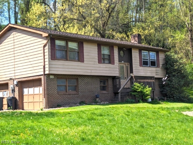 This beautiful 3 bedroom 2 bath home sits on 2.2 partially wooded acres on dead end street. This bilevel home includes living room with lots of natural light, kitchen with stainless steel appliances, breakfast bar, and dining area. 3 bedrooms and bath complete the first level of living area. Master bedroom has private bath with shower. Lower level features a large family room with stone fireplace, laundry room with washer and dryer. Attached 2 car garage. Sliding doors from dining area lead to wrap around back deck. A great place to relax and enjoy the outdoors. Perfect location for privacy. Gordon Brothers Kinetico water system. Many updates to the home. Needs some trim finished on baseboards and door frames. Great location near major roads and shopping. Call for an appointment to see all this home has to offer.