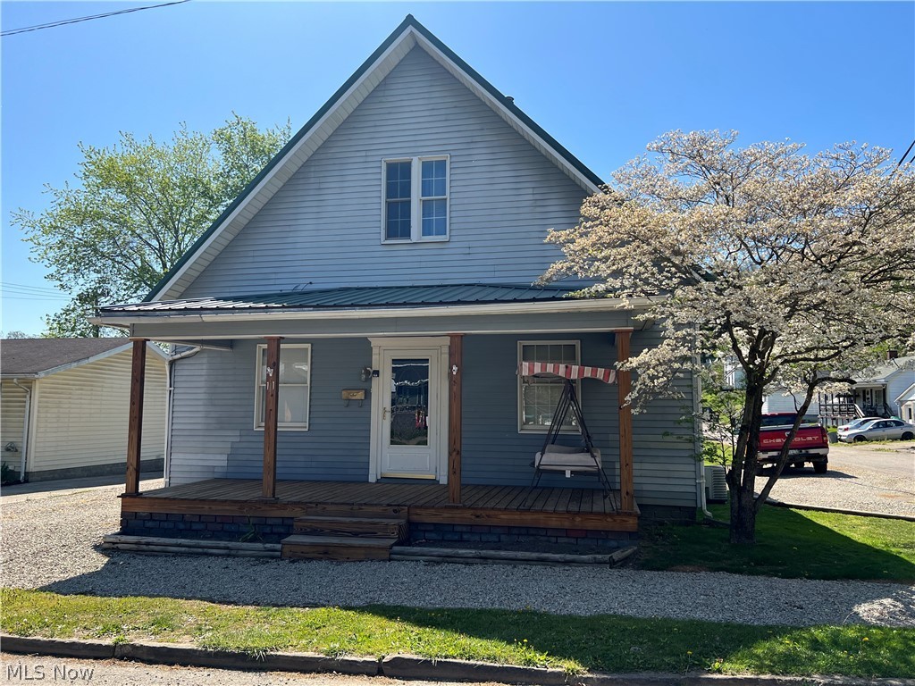 Lots of updates!!! This home has tons to offer, and comes with 2 parcels that sit on a quiet corner lot. This home features a spacious eat-in kitchen, which walks out onto a brand new large covered deck, a wide covered porch, 3 bedrooms, 1.5 baths, and a flex space off of the kitchen to use as you choose. A detached garage that includes electric and a long built in workbench. Brand new metal roof on home and garage both. A brand new furnace and hot water heater are being installed before closing. Tons of parking available between 2 driveways. Priced to sell and won't last long!