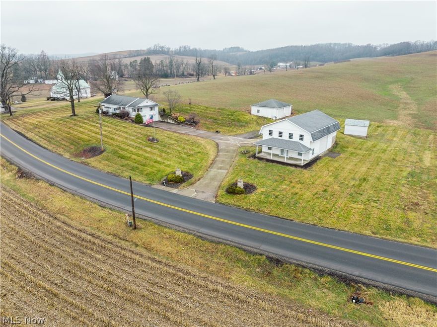 ONSITE LIVE AUCTION SATURDAY APRIL 11TH 10:00 AM!! Parcel 1 of 5. 
Available via onsite-live auction, this beautiful 32-acre farm offers mostly open, tillable land, sizable building lots, a charming ranch home with outbuildings, and a prime location just minutes from Sugarcreek, New Philadelphia, and Ragersville. The 1,656 sq ft ranch home features 3 bedrooms, 2 full baths, a kitchen-dining room, and a living room with a fireplace—all on the main floor. The full basement includes a full bath, kitchenette and laundry area, ample storage or hobby space, fireplace, and access to the drive-under 2-car garage. Outbuildings include a 28’x30’ heated block garage, and a 32’x 48’ framed bank garage building with a partially finished apartment area, a spacious second floor, and a covered front porch. The property also boasts prime tillable acreage with beautiful building sites on sizable parcels. Utilities to the home include electric, free gas, gas furnace heat, a fireplace, central air, a private well, and a private septic system. Contact us today for more information or make plans to attend the open house! 
Open House: Thursday, April 2nd, from 4:00 to 6:00 PM 
Parcel 1: 6.3 acres, 459 ft frontage, ranch home & outbuildings
Parcel 2: 6.4 acres, 50 ft frontage, open tillable acreage
Parcel 3: 9.2 acres, 400 ft frontage, open tillable acreage 
Parcel 4: 5.7 acres, 1,147 ft frontage, open tillable acreage
Parcel 5: 4.6 acres, 736 ft frontage, open tillable acreage