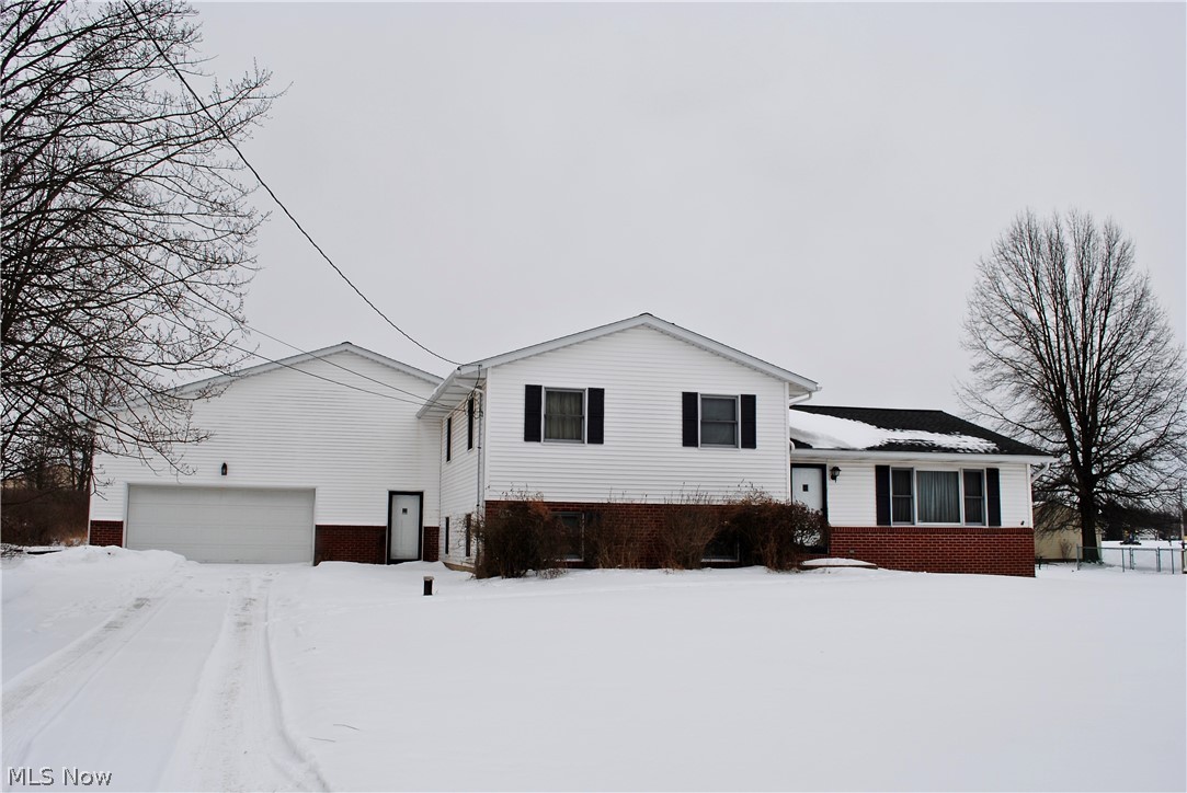 Welcome to a one of a kind opportunity to own a beautiful property with it's own Airplane Hangar and with access to taxi to the runway! As you walk through the front door of this beautiful split level home you are greeted by a large open floor plan with a large living room, dining room , and kitchen. As you walk upstairs you will find a full bathroom and three bedrooms! On the lower level you will find a large family room, an office/fourth bedroom, and a second full bathroom! Walk through the family room and you have access to your very own 1512 sq ft airplane hanger garage! This beautiful home also has a full basement that has been waterproofed. Outside you have have plenty of room to play on the 1.03 acre lot with a a backyard patio to enjoy this summer! This original owner home has an updated furnace and A/C (2017) and Generac home generator! Call and schedule your appointment today!
