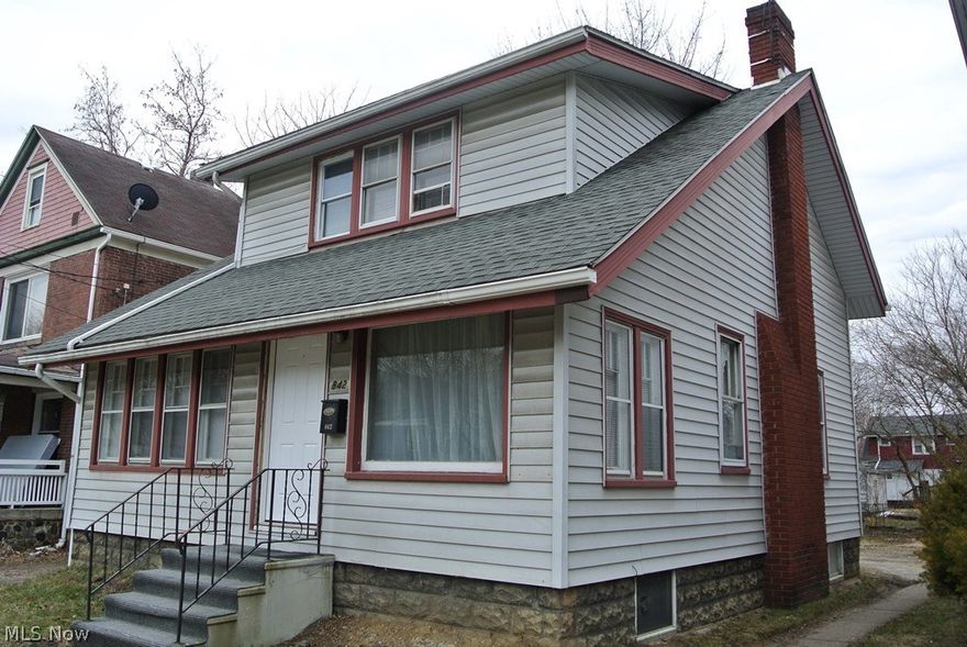 Cute as a button. Nothing to do but move in and enjoy this totally remodeled home. This is much bigger than it looks too! Totally remodeled kitchen with new oak cabinets, counter, sink and flooring. All new paint and carpet throughout the entire house. The large formal living room has fireplace centered on outside wall (with full exterior brick chimney) and built-in bookcases in the dividing wall between the living and dining room. The dining room has a full wall of built-ins with glass doors and lots of drawers and a nice ceiling fan. At the front is a sunny solarium with French doors from the dining room. Loads of storage too. Bonus room on second floor is a walk-in closet or great little play room for the kids. Other room on first floor is the eating/dinette area at the rear of the brand new kitchen. New entrance doors. Cleaned and painted basement. New breaker box 2017. Dimensional shingles on roof. Nice deep back yard too, partially fenced and three parking spaces.
