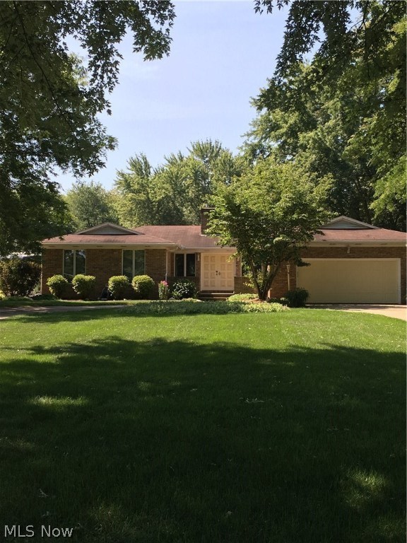 New price and neutral paint March 2017. Great location - a quality home! All brick 1692 sq. ft. ranch, 1-acre lot makes entertaining enjoyable. Convenient welcoming horseshoe shaped all concrete drive. Hospitable living room, abundant natural sunlight with 5' windows throughout, stone WDBR fireplace (gas available). Large back deck views professionally landscaped gardens and delightful feathered friends. You'll appreciate handiness of dining room with sliders to bright sun porch partially shaded by mature trees. Eat-in kitchen boasts bay windows and custom built island. Huge walk in pantry with abundant storage situated across from 1st floor laundry. Many recent energy efficient upgrades includes newer hot water heater, furnace, central air, full water softening system with a reverse osmosis tap at kitchen sink and refrigerator. Double-garage door opener with security keypad. Newer appliances include oven, refrigerator and dishwasher. The full basement has a professionally fin