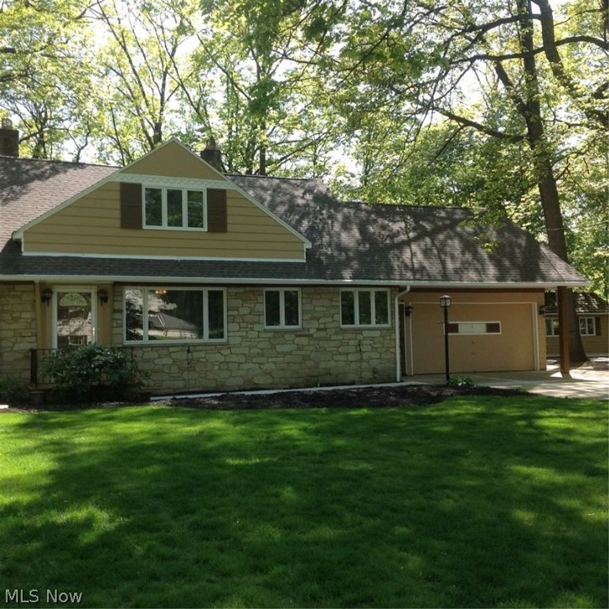 Outstanding Scenic and Tranquil newly remodeled 5 Bedroom 3000 sq. ft. Cape Cod in one of Cleveland Heights most sought after Neighborhoods. Priced at less than $64.00 per SQFT. Updates Galore in this 5 Bedrooms and  3-1/2 baths home. A beautiful 1st Floor, Master bedroom and Master Bath w/double showers. Their are double fireplace, and an  over sized Great Room, with a  with sliding door that enters on to a deck and a  walk out that overlooks awesome scenic nature wooded ravine 
 lots of acreage and a  creek with waterfall.  Home includes dual HVAC units to support perimeter cooling & heating comfort, property includes unattached newly remodeled 20 ft x 10 workshop with a 9 Ft. ceiling, with 10 electric outlets and an exhaust fan. This home has an spacious two car Attached Garage  Their is also 1/2 a  basketball court. This property is on a  very low traffic tranquil street. Home Warranty and More. Come and see.
