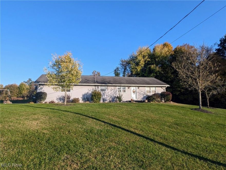 Lovely well-cared for ranch on almost an acre.  Home features 3 bedrooms, 1 1/2 baths, full partially finished basement, 2 car attached garage, huge deck with above-ground pool, a stamped concrete patio and 12x20 storage shed with electric.  Tons of storage in this well built ranch and lots of yard space for picnics, pool parties and entertaining around your own firepit.  Enjoy the rural landscape, open fields and stately trees.  All appliances convey including washer, dryer, microwave, refrigerator, stove, water softener.    Move right in!  Just 2 miles from Minerva!  Don't miss this opportunity!