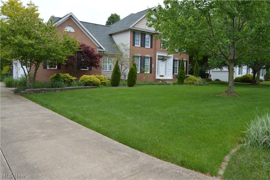 Stunning landscapes surround this 4000 sq. ft. walk out finished basement of this 1995 Colonial. A gentle stroll over the relaxing creek on the 36 ‘arched bridge which leads to a water feature with 2 bio falls flowing into the stream. Sit out in the rear gazebo or perhaps on the Trex deck with the new hot tub overlooking the in ground pool. The lawn features an irrigation system, invisible fence w/ a uni-lock patio out the finished lower level of the home that has a entertainment screen, wet bar and play rooms. The charming interior boasts with granite counters, 1st  & 2nd floor sunrooms, Pella slider, French doors, new laminate flooring in 3 of the 4 bedrooms, Large Master complete with 3 closets, jetted tub, separate shower, wall safe. Kitchen features Viking appliances, center-island, wine rack, 1st floor laundry and office or guest room, Great room w/ gas fireplace. 3 car garage with ceilings high enough for car rack. Numerous upgrades and features detailed on attached supplemental. Your private retreat in Jackson Twp. located on a cul-de-sac street.  America’s Preferred Home Warranty included!